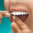 how to use floss in teeth